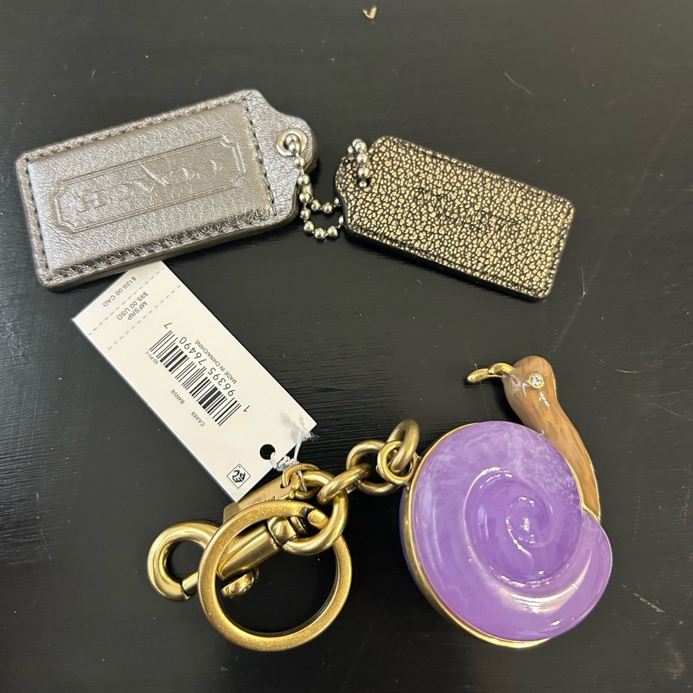 Coach snail keychain